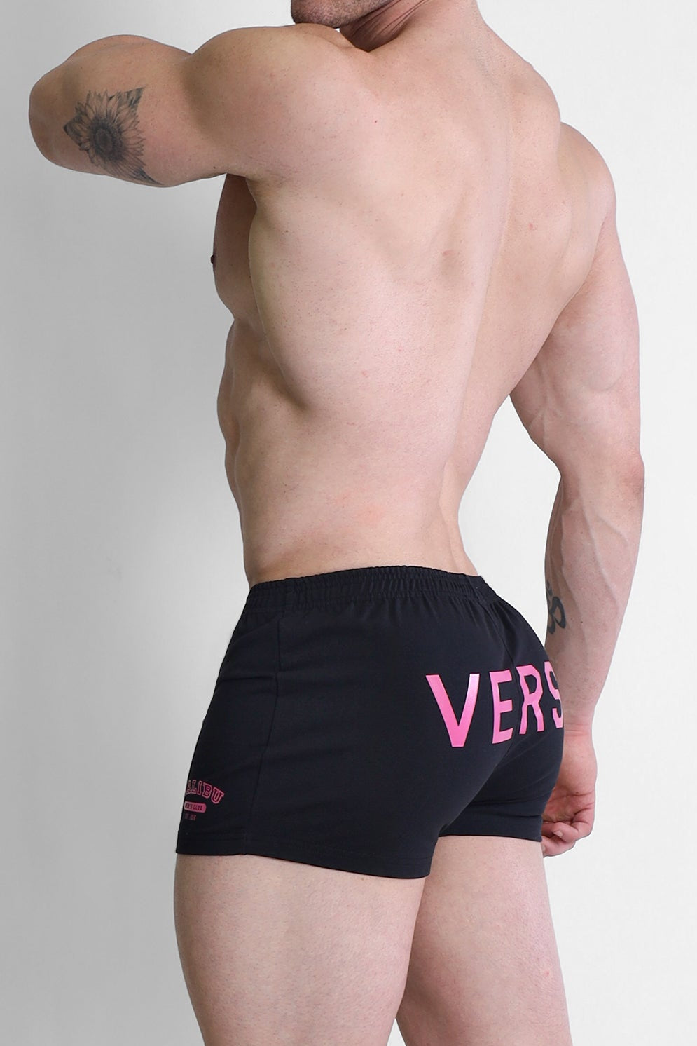 Shorts universitarios cortos de 2" con bolsillo con cremallera - Versátiles