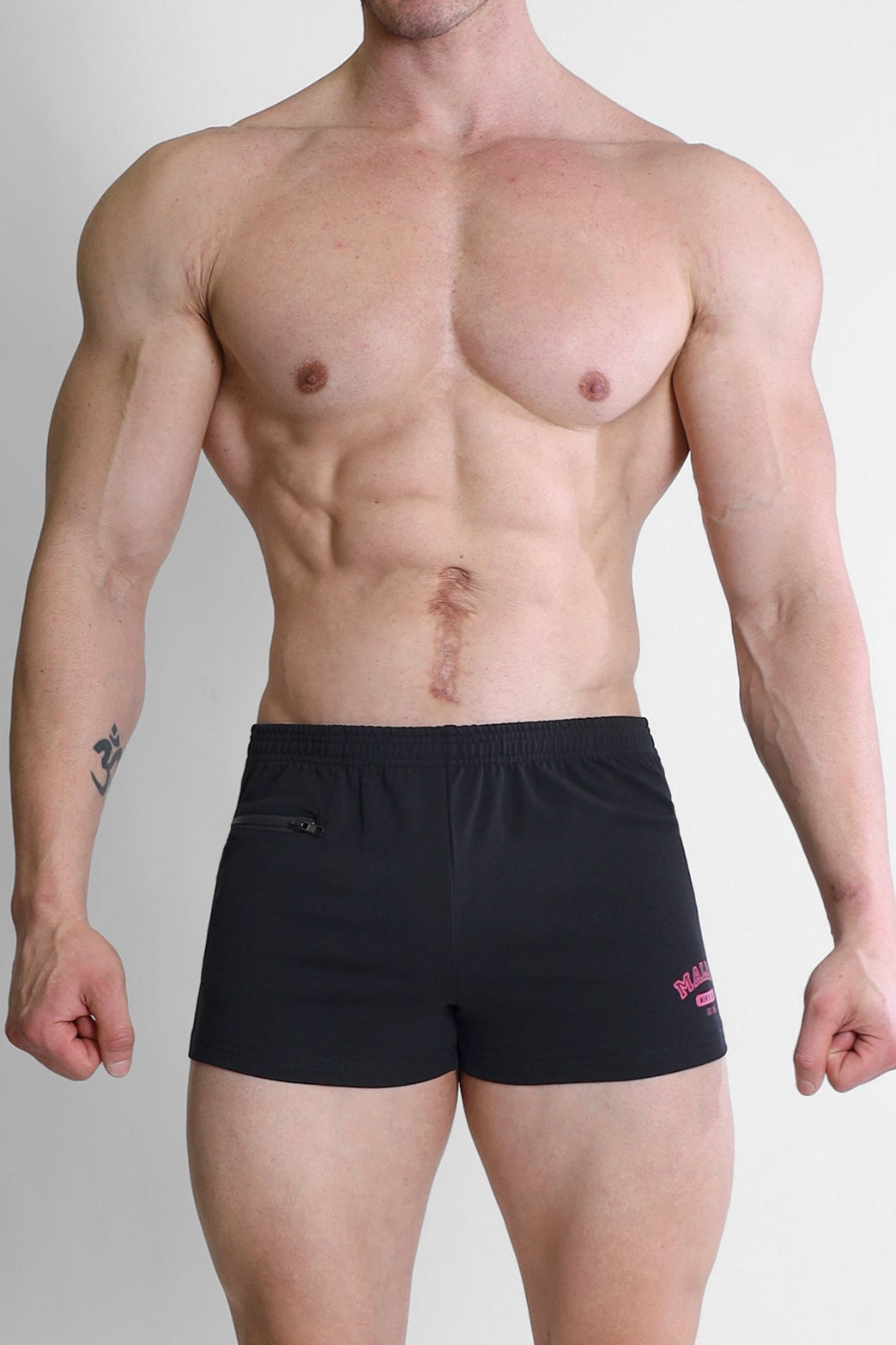 Shorts universitarios cortos de 2" con bolsillo con cremallera - Versátiles